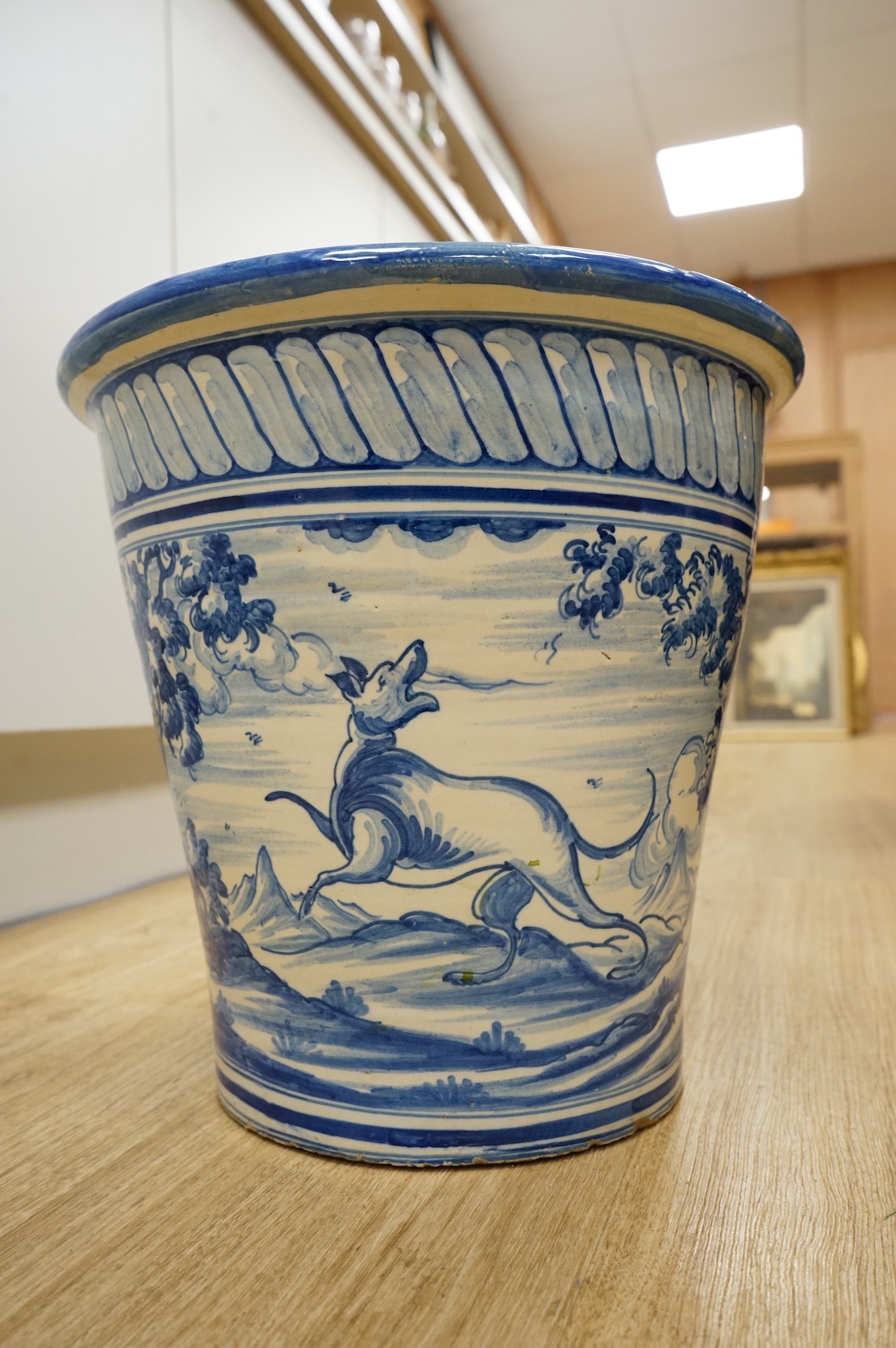 A maiolica glazed planter, 30cm high